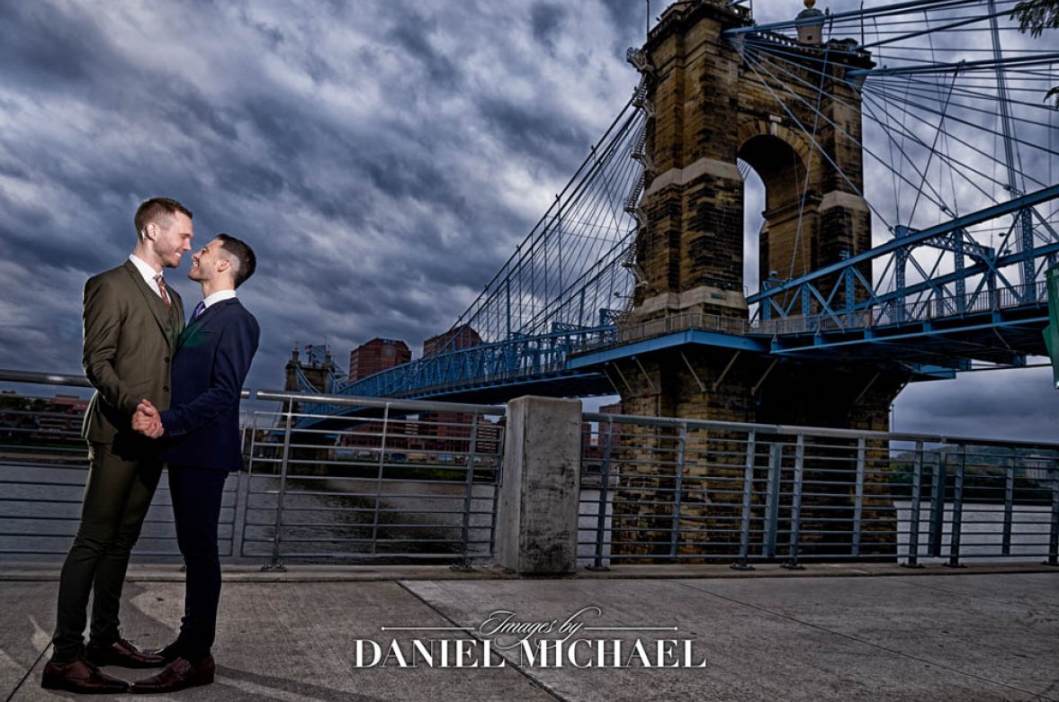LGBTQ wedding photography celebration of gay couple at Roebling Bridge